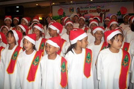 The Pattaya Orphanage choir warm up for the Christmas carols.